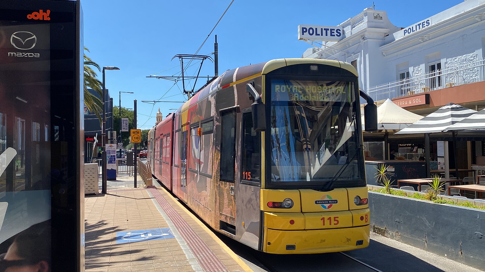 A tram departing Moseley Square in Glenelg, photographed in January 2025