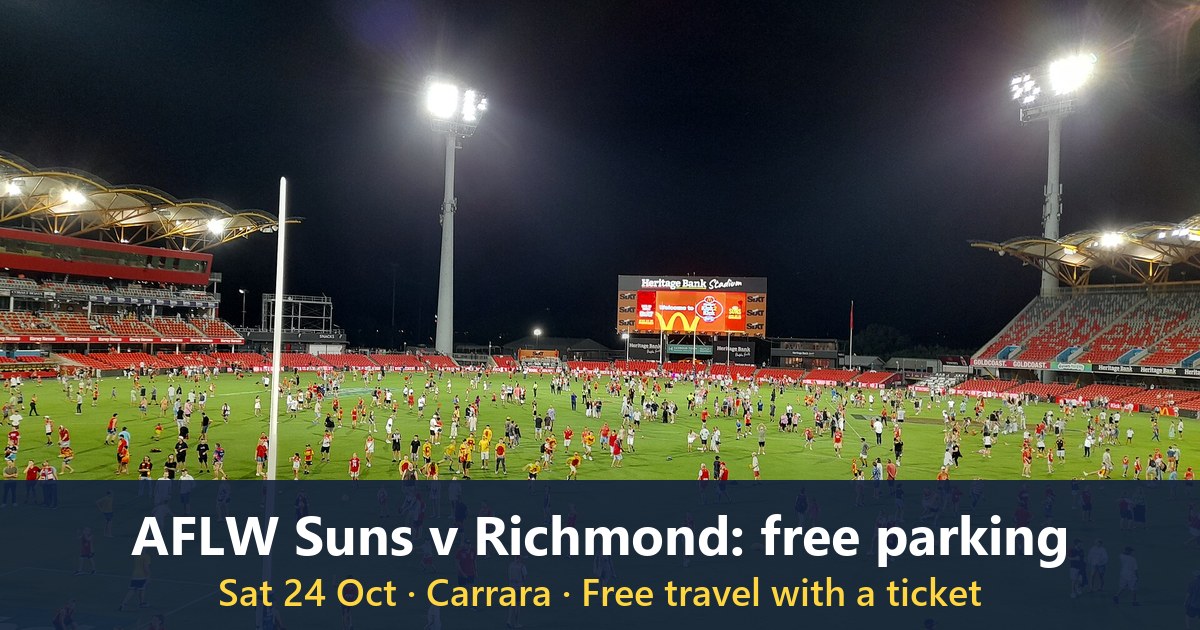 Fans on the field at People First Stadium after a Gold Coast Suns match in March 2023