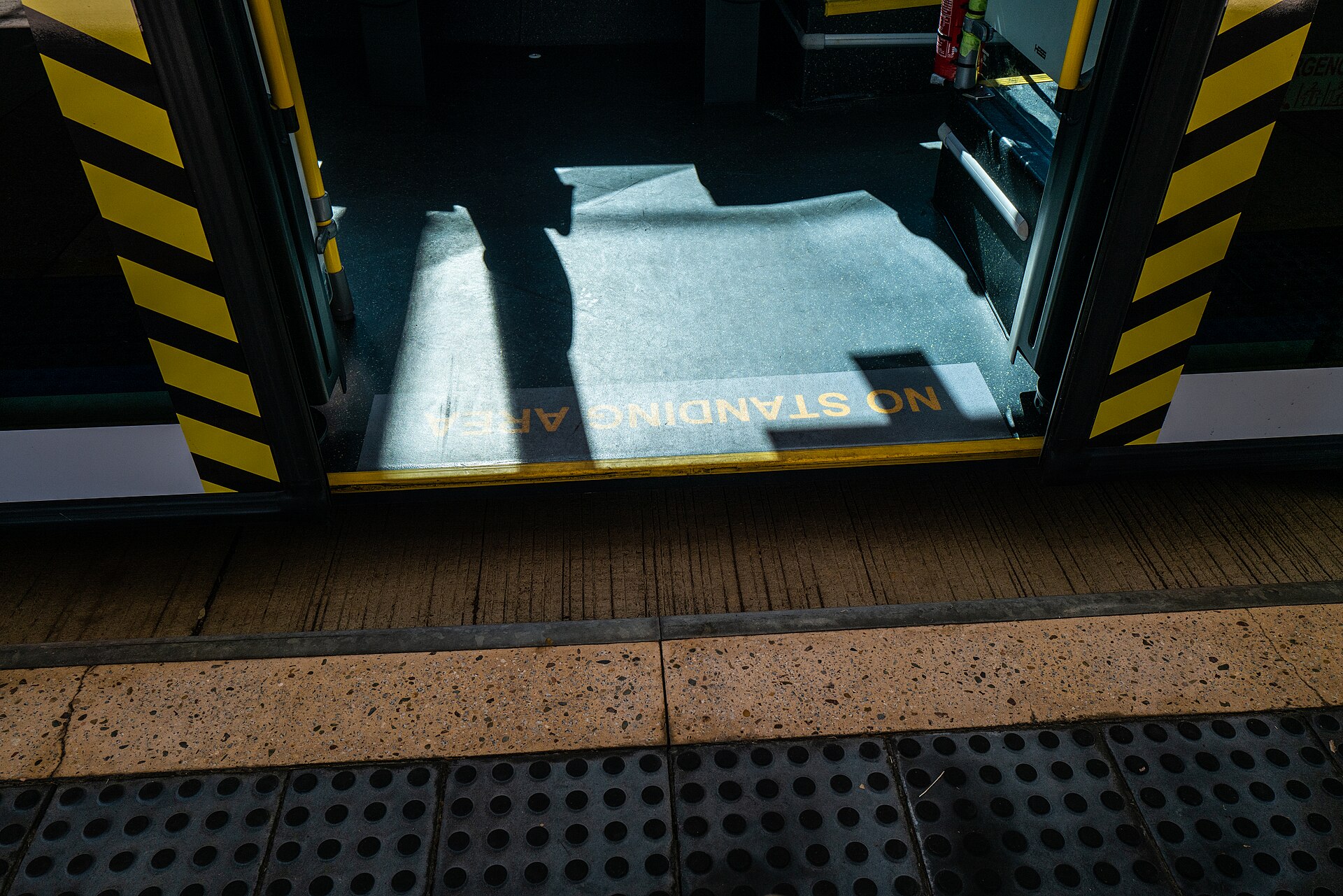 The doorway of a Brisbane Metro bus at Herston Bus Station in 2023