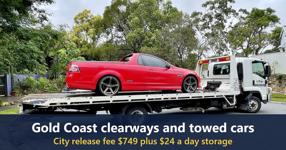 A Holden SS ute being transported by a tow truck in Queensland (photographed in 2021; not on the Gold Coast)