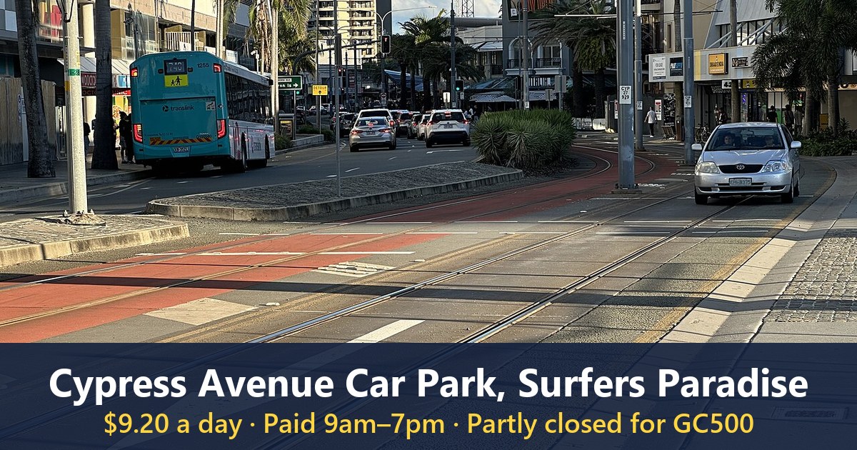 Surfers Paradise Boulevard near Cypress Avenue light rail station with a Translink bus and cars