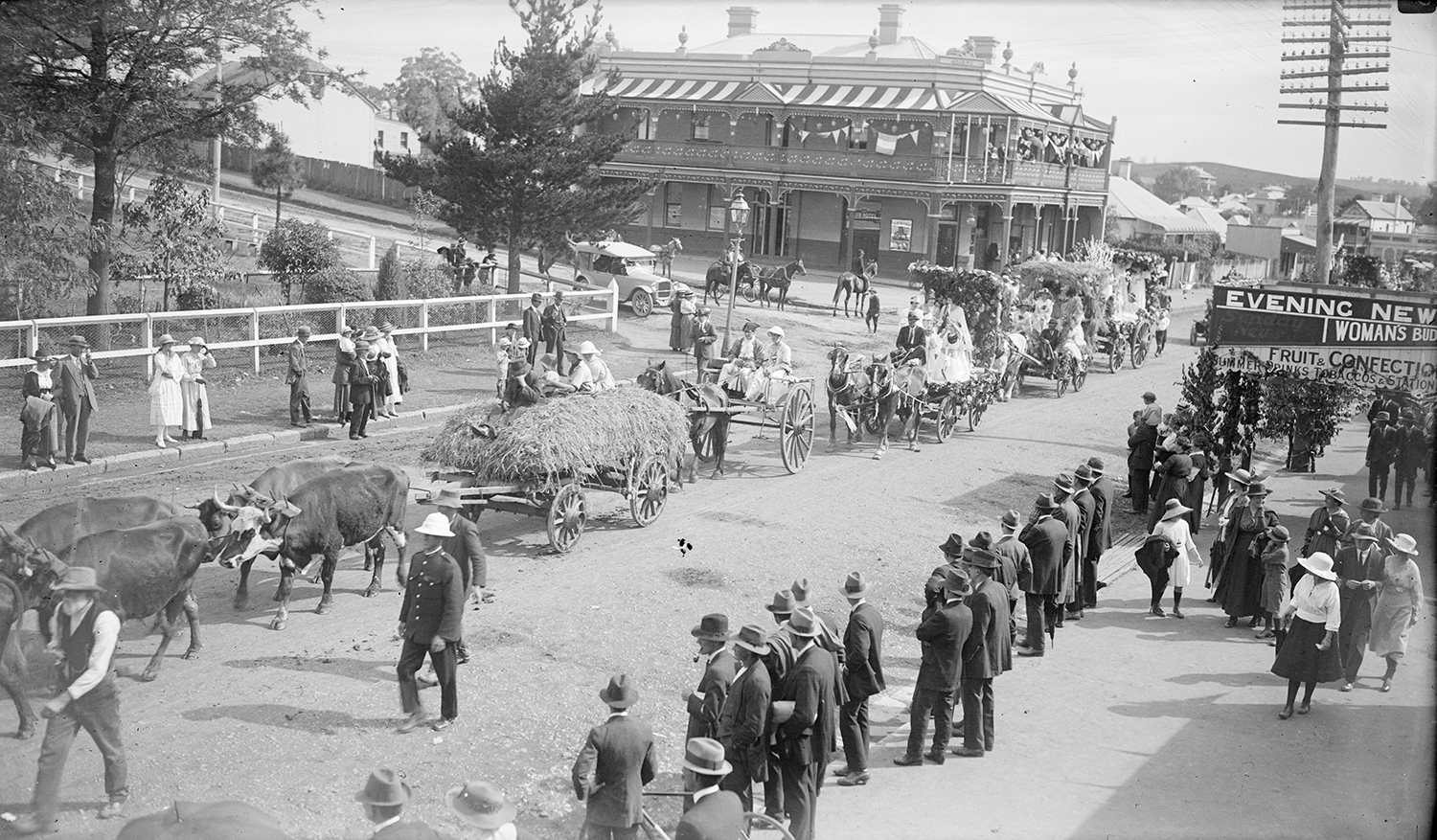 A centenary parade with wagons and a bullock team near the corner of Queen and Cordeaux Streets, Campbelltown, 1920