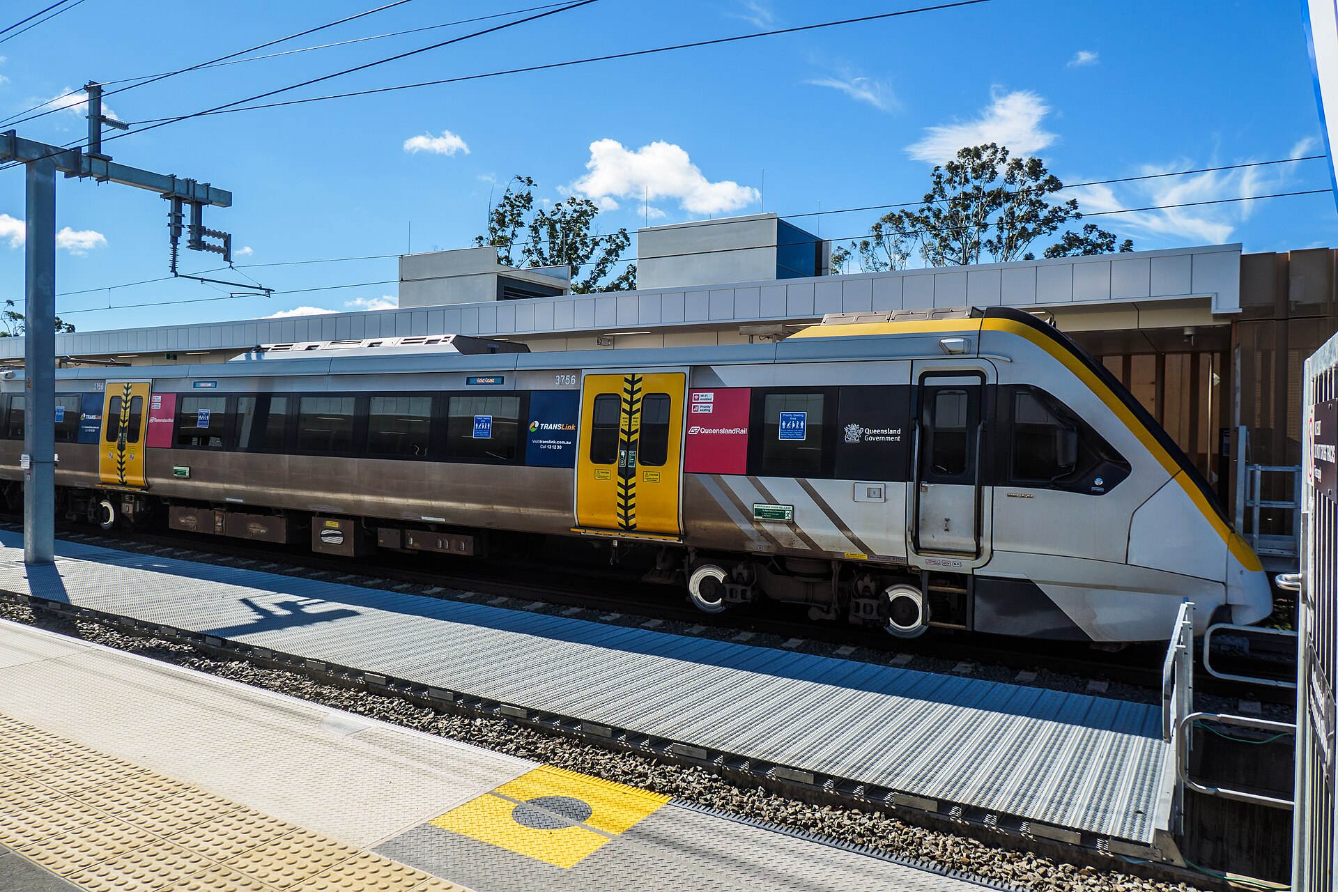 Queensland Rail train at Hope Island station, the next station south of Coomera