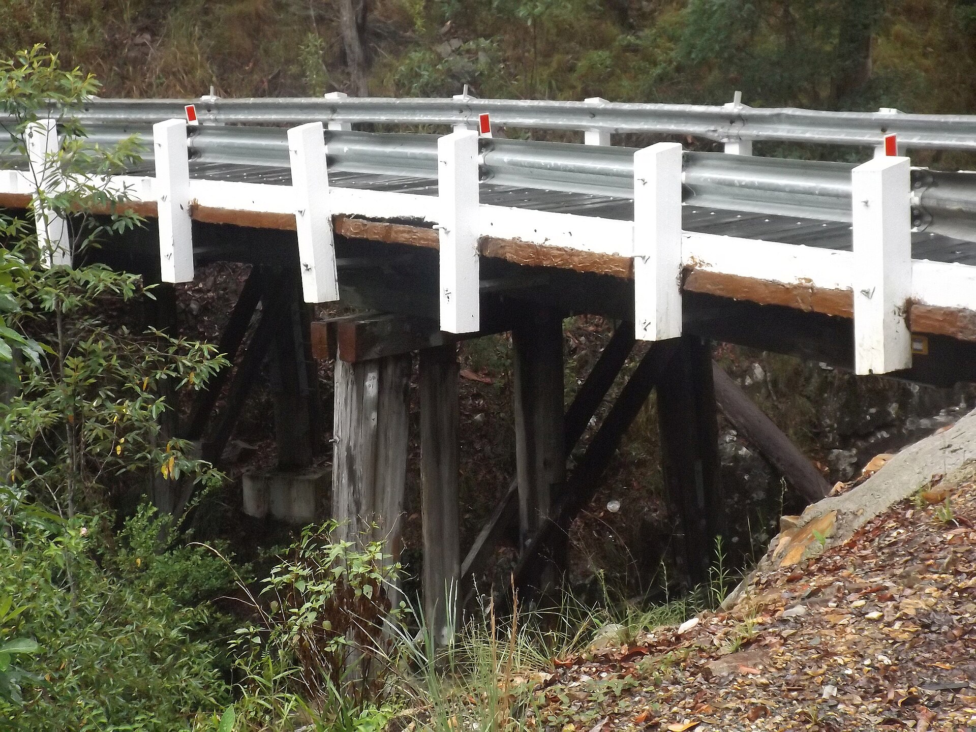 The lower wooden bridge on Springbrook Road, photographed in 2016, shown for orientation