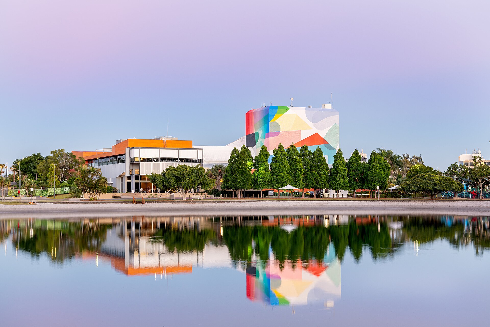 HOTA, Home of the Arts, beside Evandale Lake at dusk, photographed in 2020