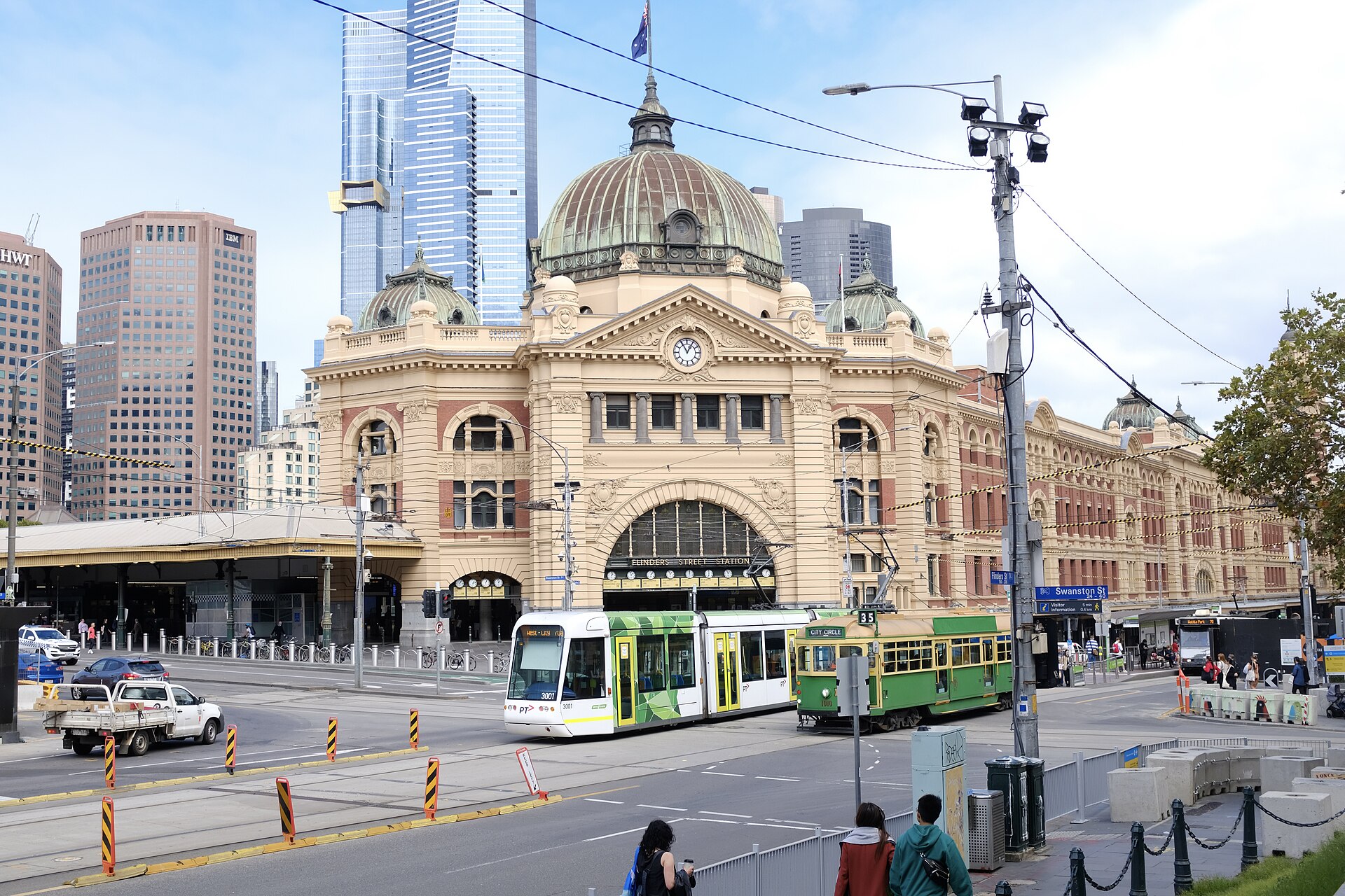 Flinders Street Station in Melbourne with trams in March 2021