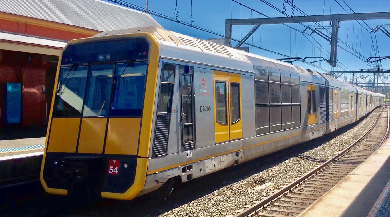 A Sydney Trains Tangara train leaving Sydenham station in October 2017