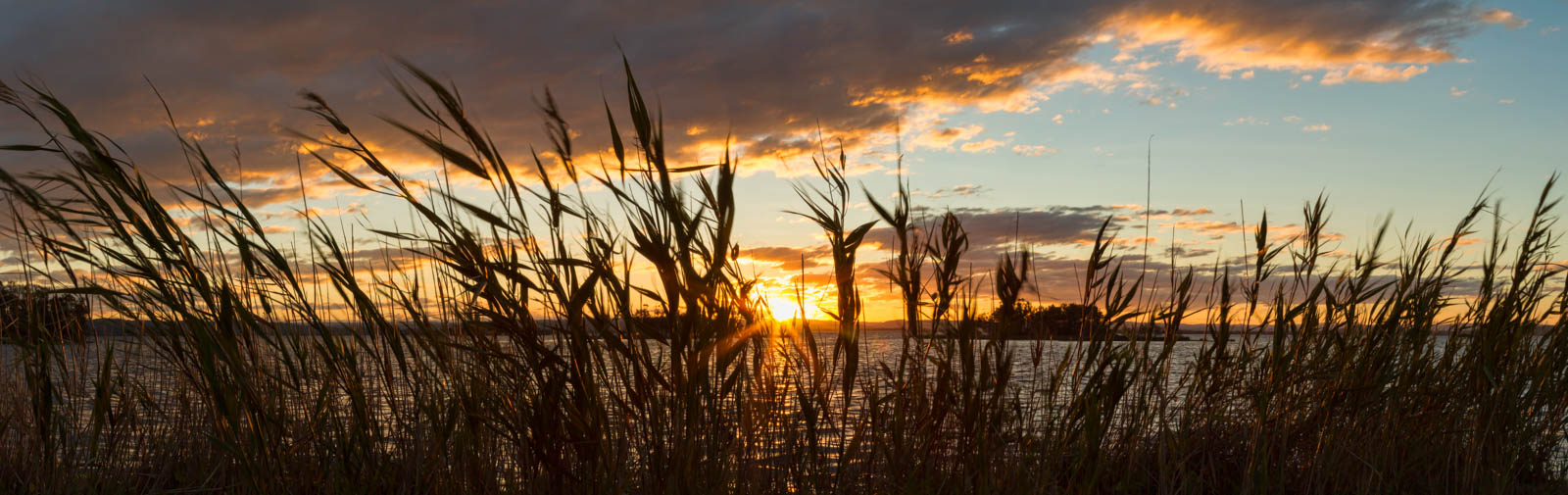 The sun setting over Lake Tuggerah near The Entrance
