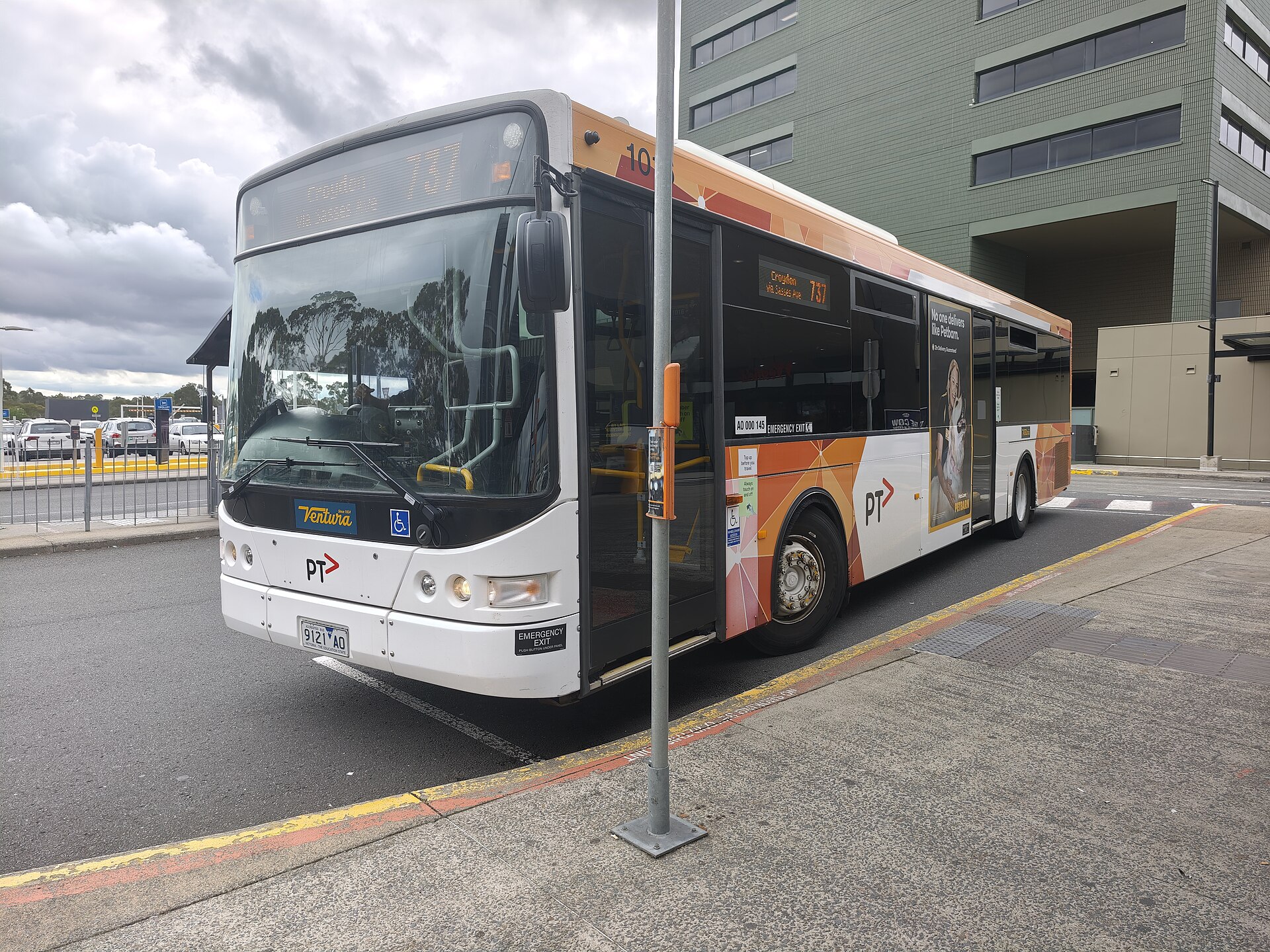 A route 737 bus at the Knox City Shopping Centre interchange on Burwood Highway, Wantirna South, March 2026